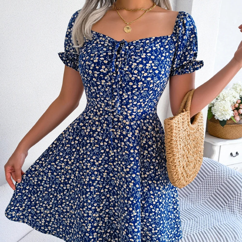 Women's floral midi dress cinched waist flowing hem vintage-inspired summer style