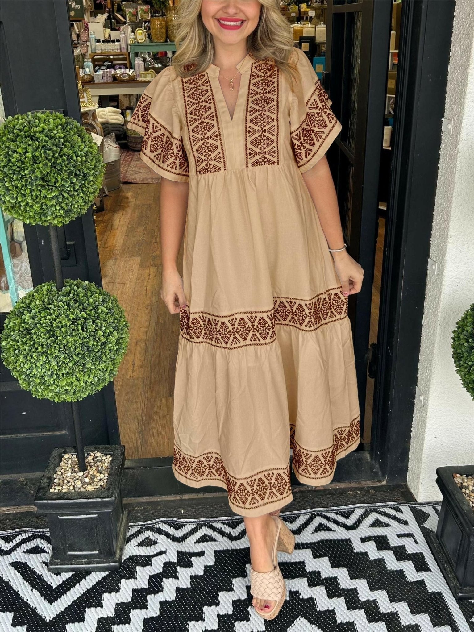 Floral embroidered boho midi dress in earthy tones with relaxed fit and intricate bohemian detailing