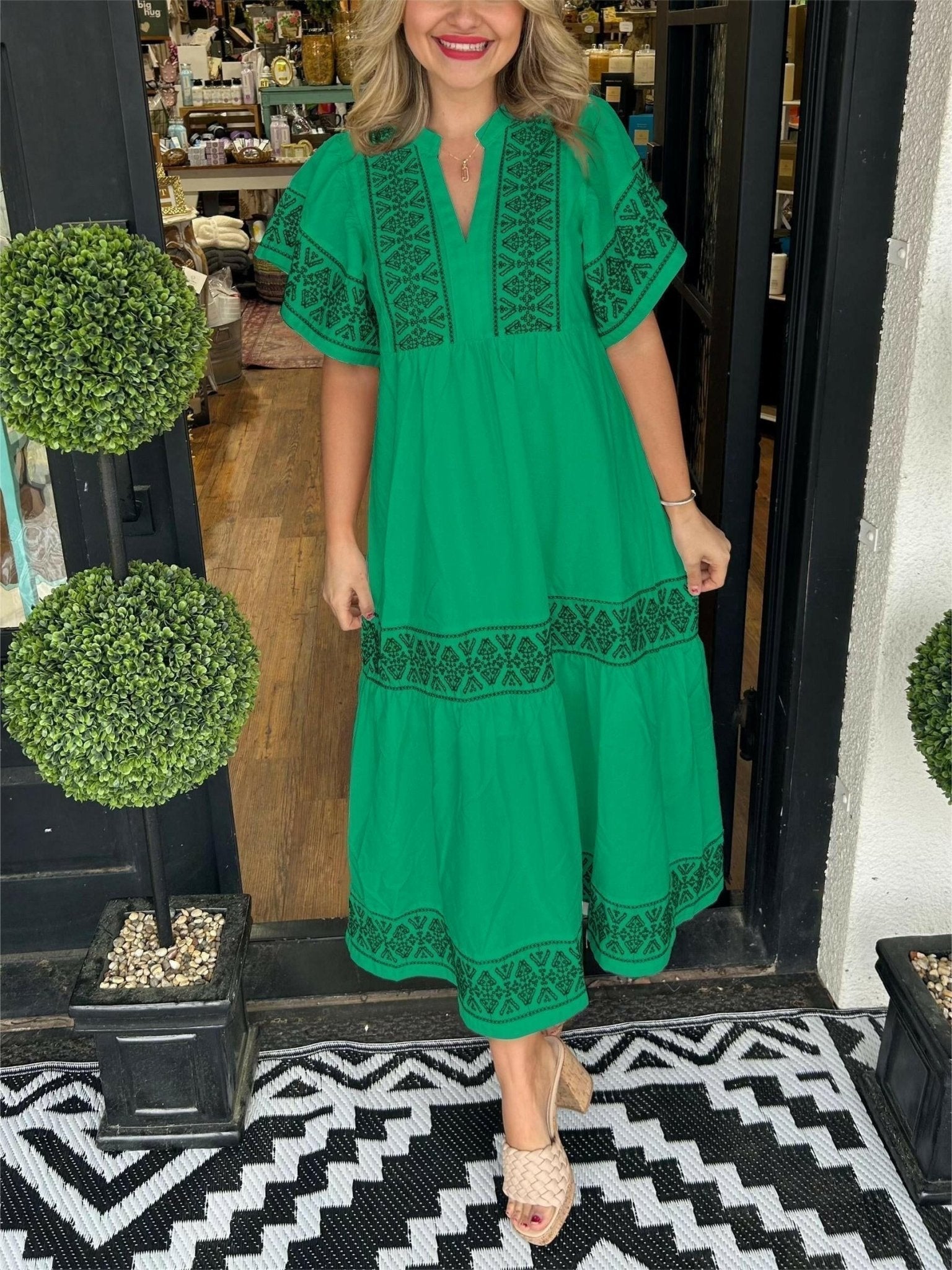 Boho midi dress with intricate embroidery, relaxed fit, breathable polyester fabric for day-to-night wear