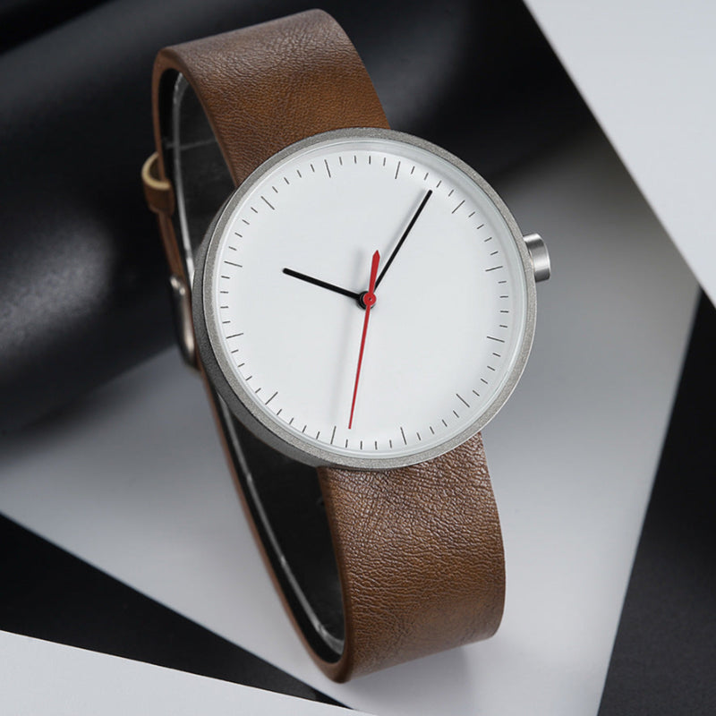 Men's minimalist leather wristwatch, round case, clean dial, versatile brown strap for casual or formal wear