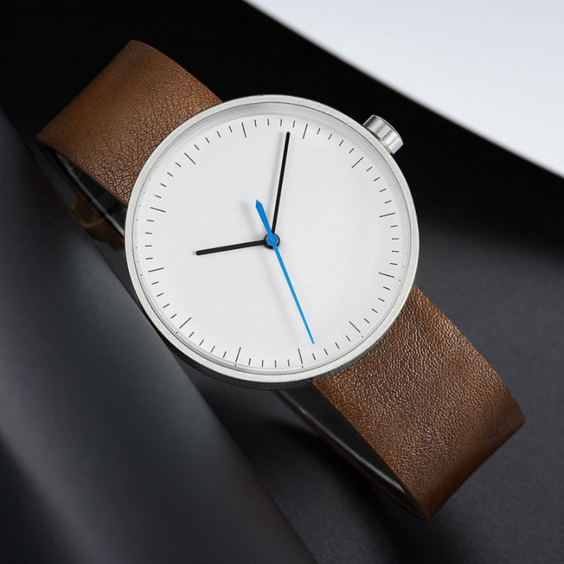 Men's minimalist leather wristwatch, round case, clean dial, versatile strap for casual to formal wear