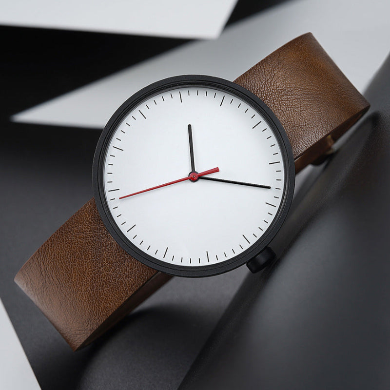 Men's minimalist leather wristwatch, round case, clean dial, slim strap, timeless elegant style