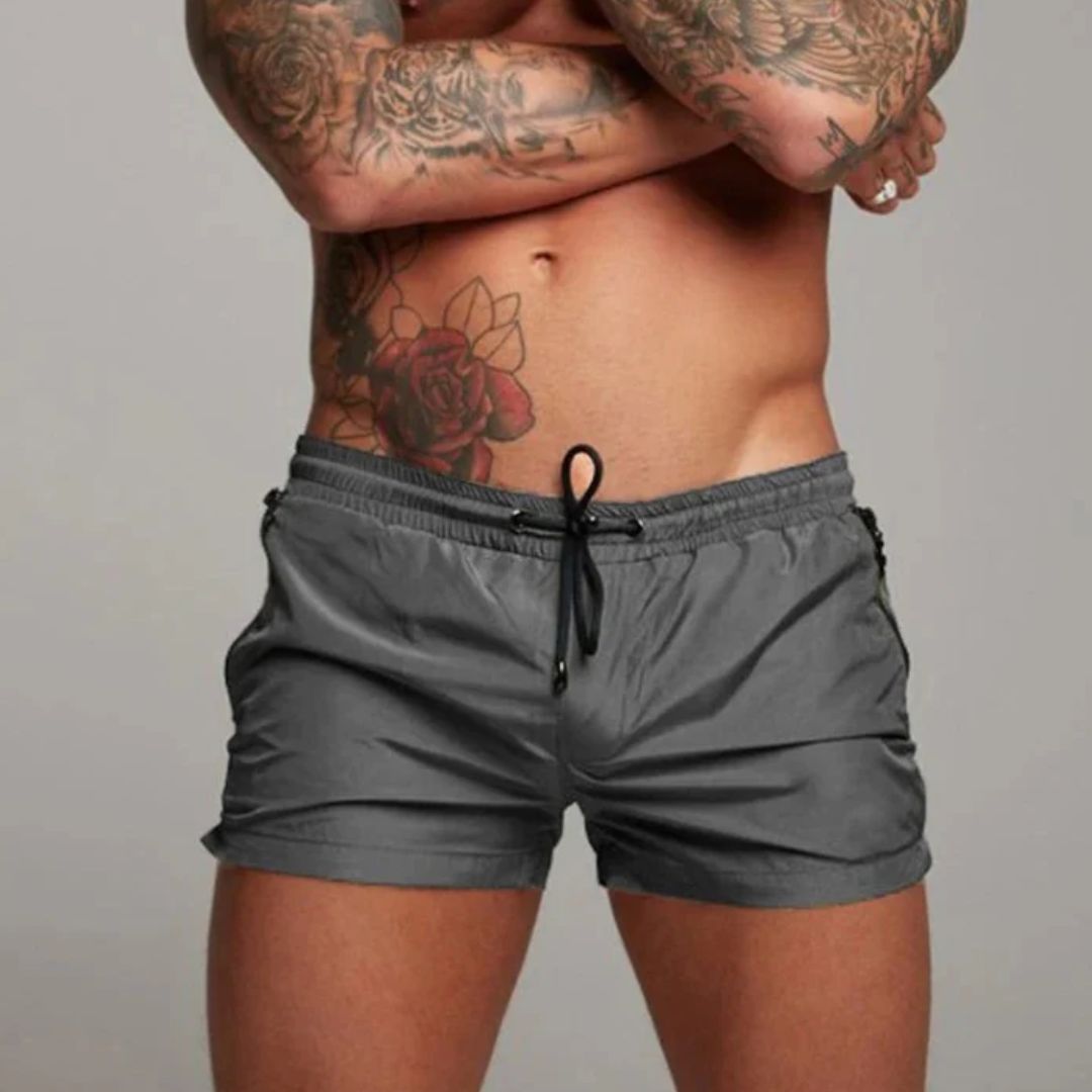 Men's slim fit swim trunks quick-dry breathable fabric with zipper pockets for active beachgoers