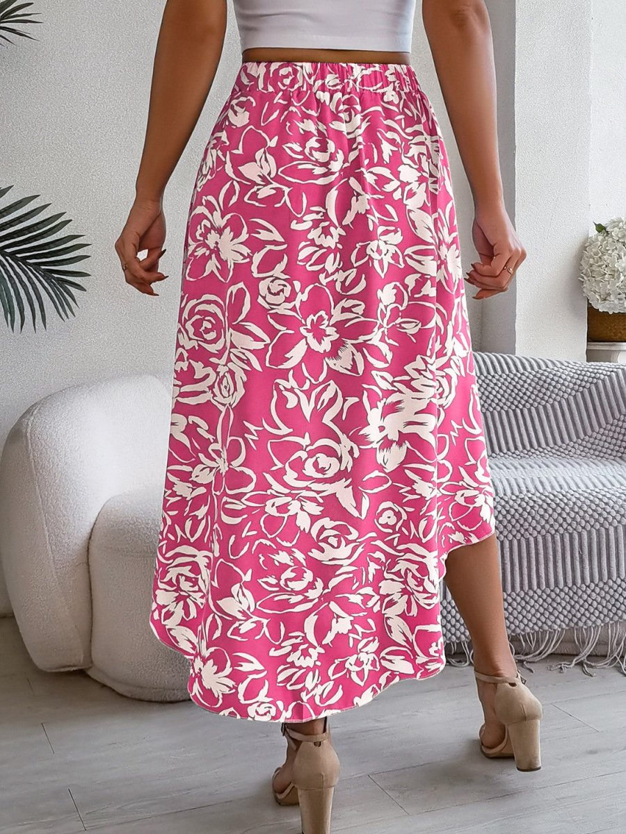 Women's high-low printed high-waist skirt with asymmetrical hem and vibrant multicolor print