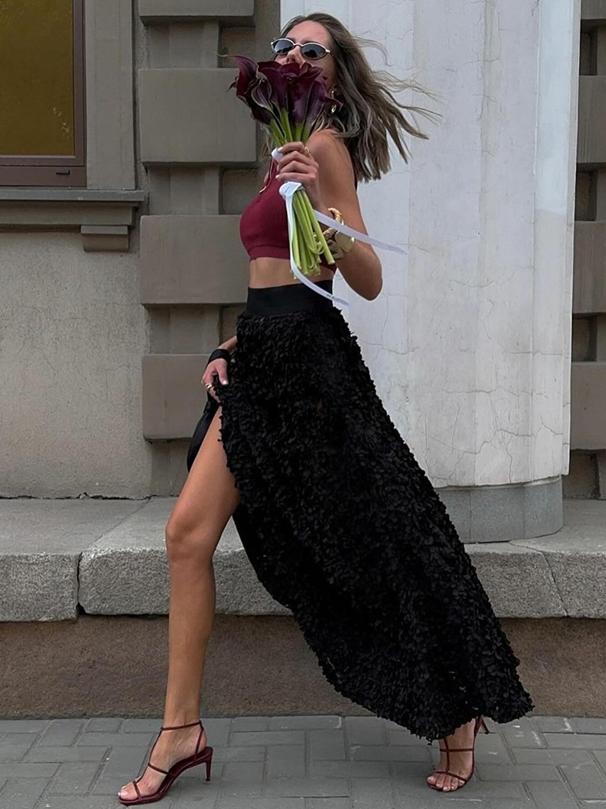 Black high-waist rosette jacquard maxi skirt with romantic silhouette and dimensional floral texture