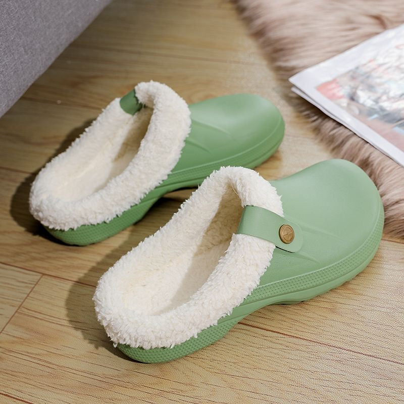 Women's wide fit winter slippers with fleece lining, waterproof upper, and non-slip sole for indoor comfort