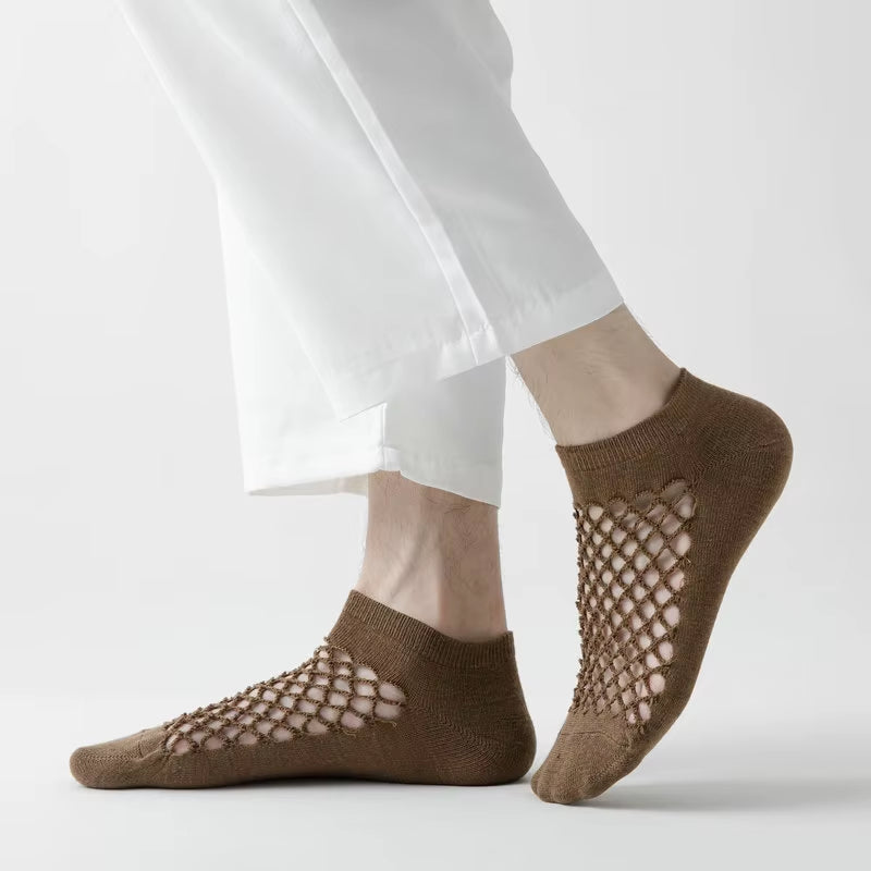 White cotton blend ankle socks set with breathable mesh panels, seamless toes, and reinforced heels