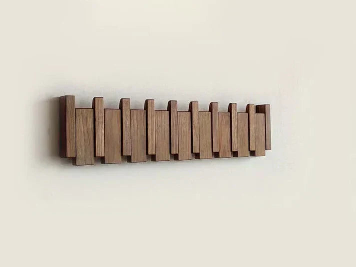 Wooden wall-mounted coat rack minimalist design natural grain warm tone entryway organizer