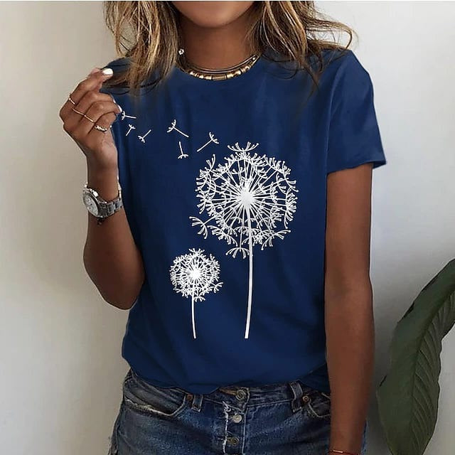 White women's casual shirt with delicate dandelion print front design and clean relaxed silhouette