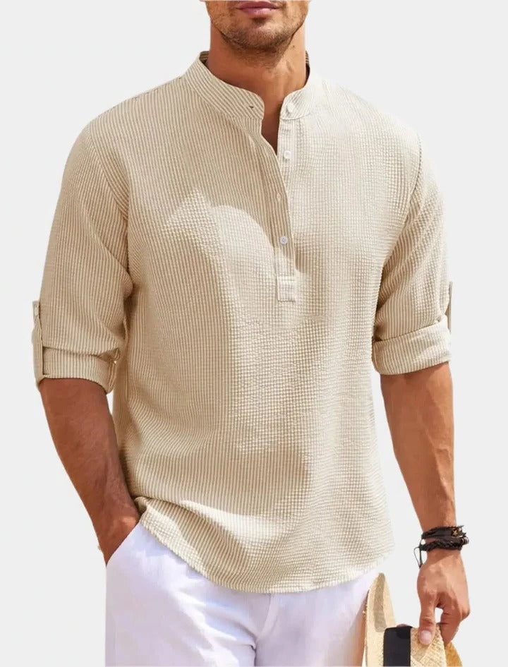 Unisex long sleeve t-shirt with collar detail in neutral tone, soft everyday layering essential