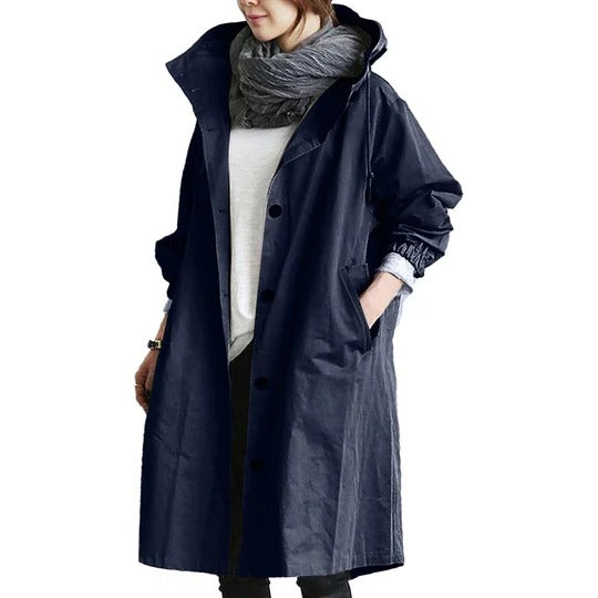 Women's long waterproof raincoat full coverage adjustable hood clean silhouette wet weather protection