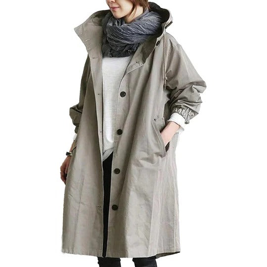 Women's long waterproof raincoat full-coverage silhouette with adjustable drawcord hood for wet weather