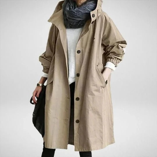 Women's long waterproof raincoat full-coverage silhouette with adjustable drawcord hood for wet weather