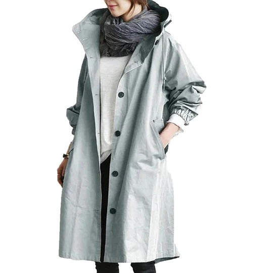 Women's long waterproof raincoat full-coverage silhouette with adjustable drawcord hood for wet weather
