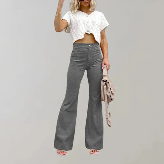 Women's black textured flared trousers with structured mid-high rise waistband for all-day comfort
