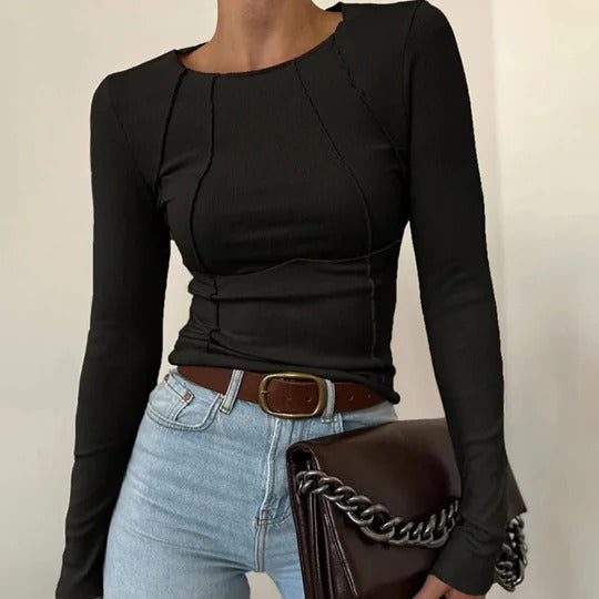 Women's long sleeve straight fit top with subtle piping details, minimalist everyday style