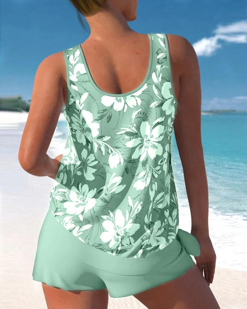 Women's tankini two-piece swimsuit with adjustable straps, sleeveless top, flattering beach-ready fit