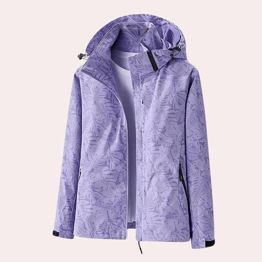 Women's camouflage hooded jacket with detachable hood, breathable fabric, and functional pockets