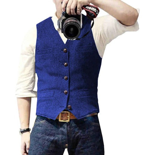 Men's blue denim vest with button closure, tailored slim fit and practical pockets for casual layering