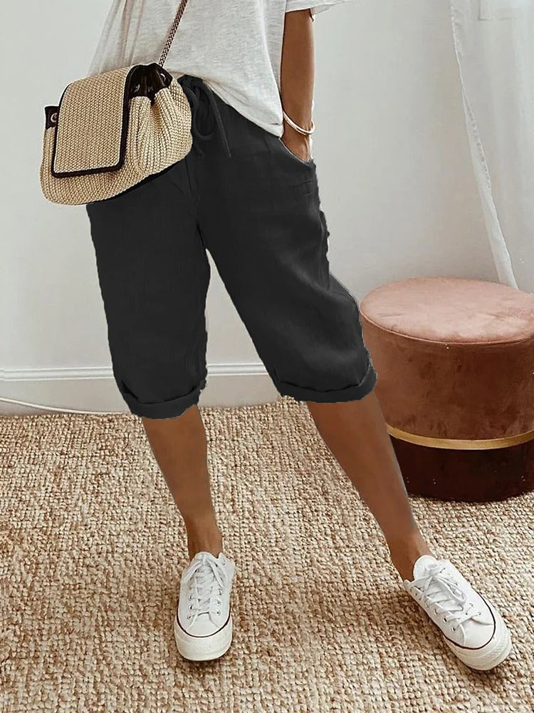 Women's relaxed-fit drawstring shorts with pockets, elastic adjustable waist, casual warm-weather style