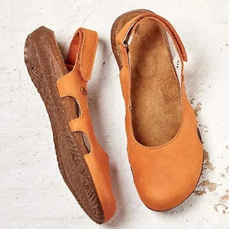 Women's closed-toe sandals with cushioned footbed, secure fit, and protective toe coverage for all-day comfort