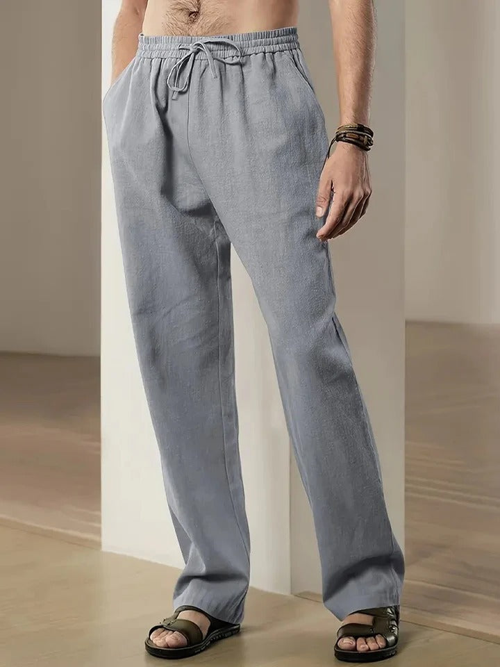 Men's white loose-fit lightweight summer pants with breathable fabric and adjustable drawstring waist