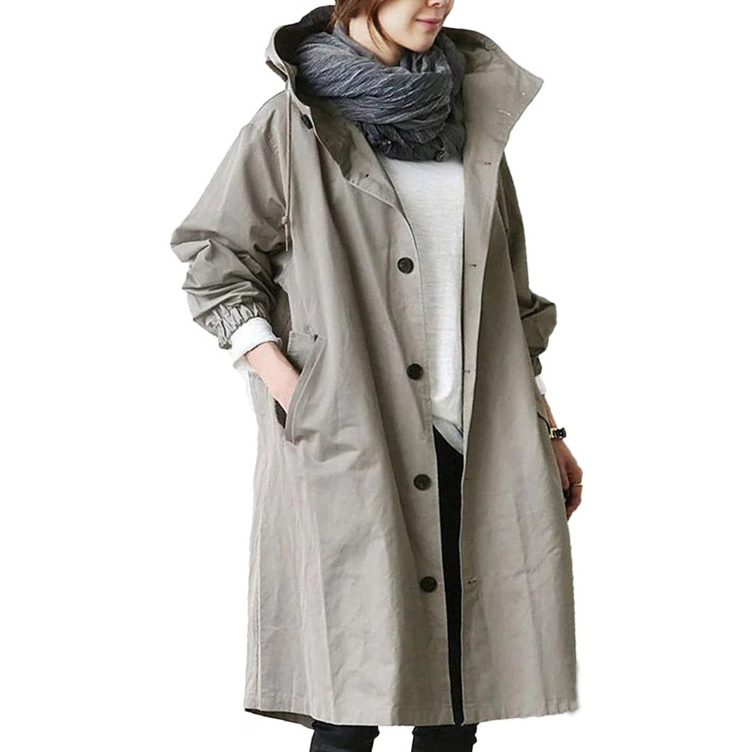 Mid-length waterproof rain jacket with hood and pockets, lightweight outdoor wear for all weather