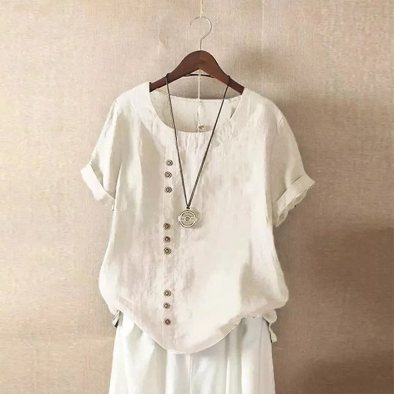 Women's relaxed-fit short sleeve blouse with rounded collar and front button details for office wear