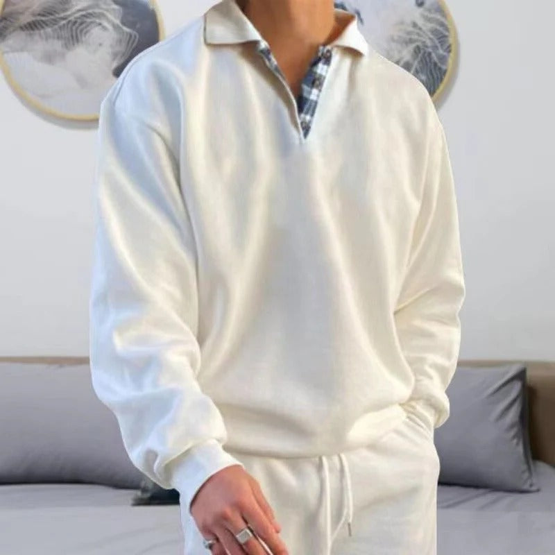 Unisex straight-cut pullover in neutral tone, classic versatile fit for everyday layering and coverage