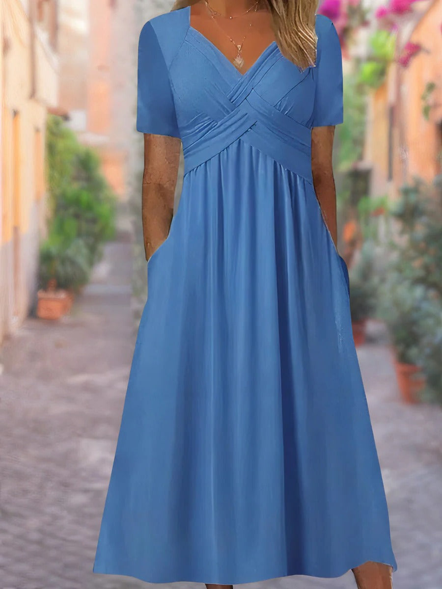 Flowy v-neck summer dress in solid color, relaxed silhouette with structured collarbone neckline