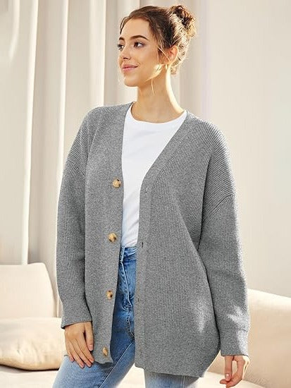 Women's oversized V-neck cardigan with button closure, dropped shoulders, cozy layering knit