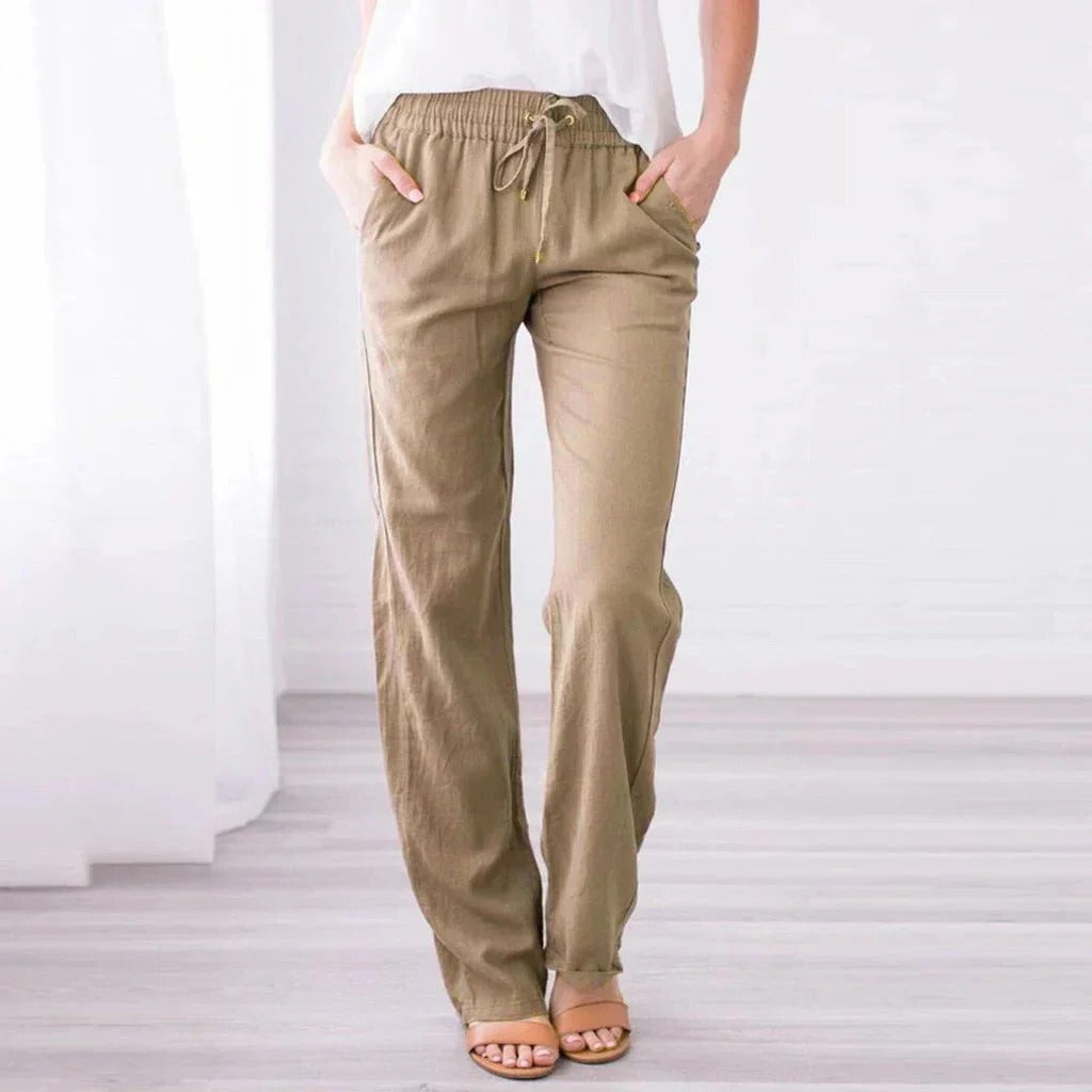 Relaxed fit women's trousers in neutral tone, lightweight breathable fabric for casual everyday wear