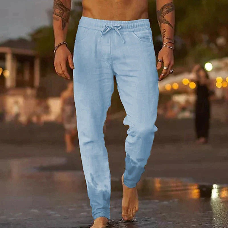Men's lightweight breathable casual trousers in neutral tones, relaxed fit with timeless warm-weather styling