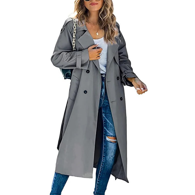 Women's long trench coat full-length silhouette in neutral tone, elegant transitional season outerwear