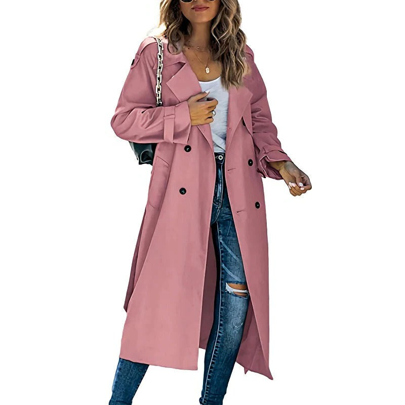 Women's long trench coat full-length silhouette in classic neutral tones for spring and autumn layering