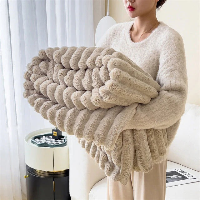 Ultra-soft insulated plush blanket in neutral tones, fluffy texture for indoor outdoor everyday warmth