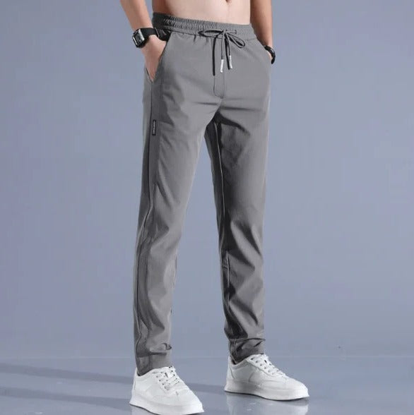 Men's lightweight quick-dry stretch pants in solid color, slim active fit with adjustable drawstring waist