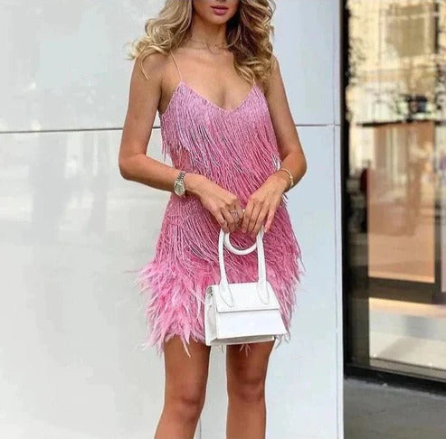 TrendAura mini party dress with feather accents, short silhouette, bold statement evening style