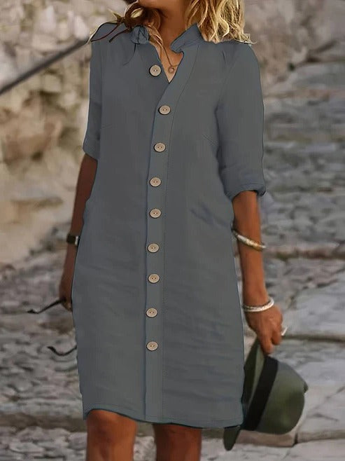 Women's black shirt dress with button front closure and classic collar, versatile everyday chic style