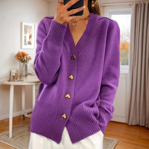 Women's sleeveless open-front knitted cardigan with pockets, versatile layering style for year-round wear