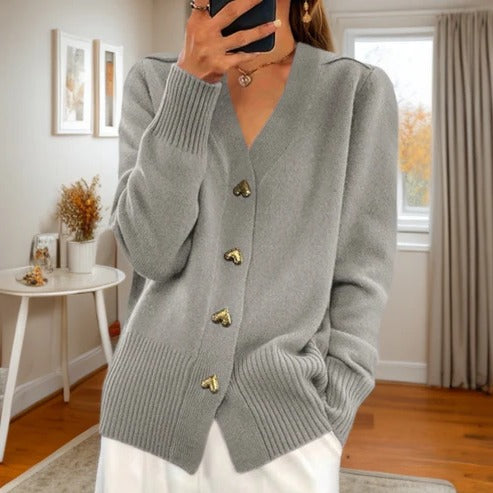 Women's sleeveless knitted cardigan open-front style with pockets for effortless year-round layering