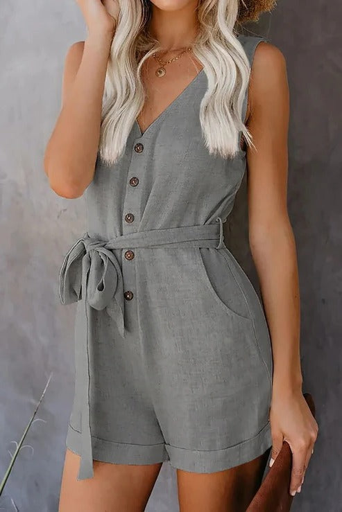 Women's wide-leg short jumpsuit with V-neck, tie belt, pockets, and relaxed summer silhouette
