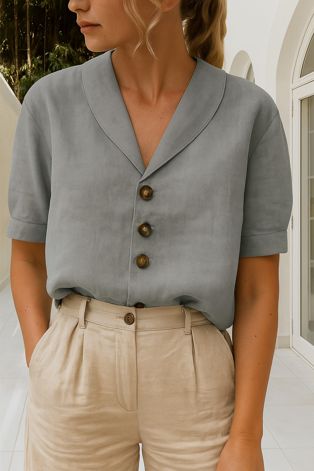 Women's solid soft tee with envelope neckline, button accents, and relaxed everyday fit