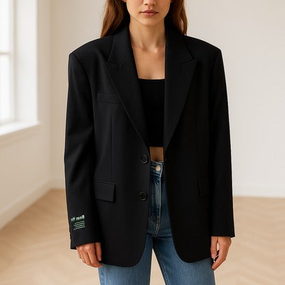 Women's oversized blazer relaxed fit classic lapels professional workwear versatile tailored silhouette