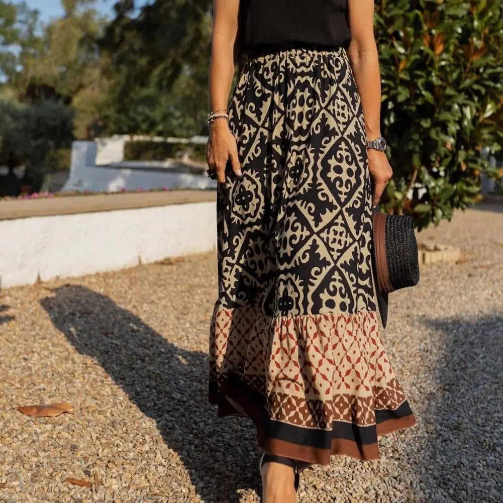 Women's high waisted flowing midi skirt lightweight summer style with flattering defined waist silhouette