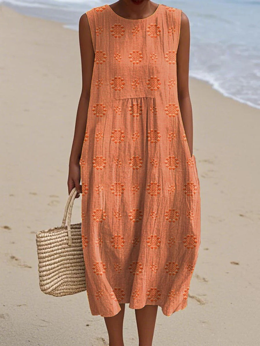 Women's sleeveless midi dress with embroidered circular motifs, breezy everyday travel-ready style