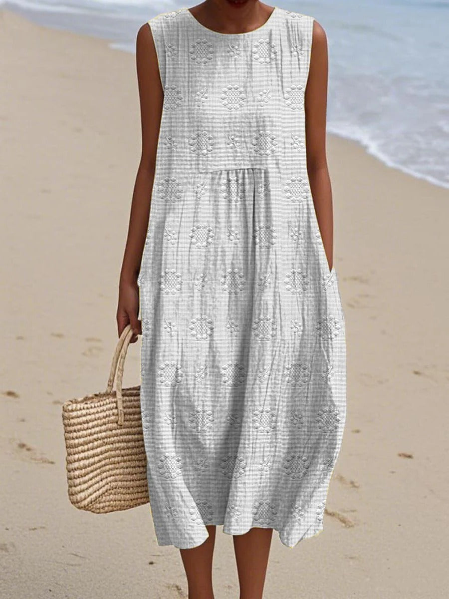 Women's sleeveless midi dress with embroidered circular motifs, breezy everyday travel-ready style