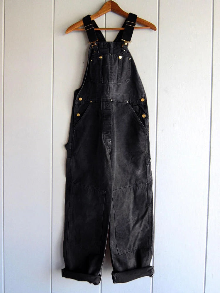 Women's olive green utility bib overalls with adjustable straps and multiple pockets for durable workwear