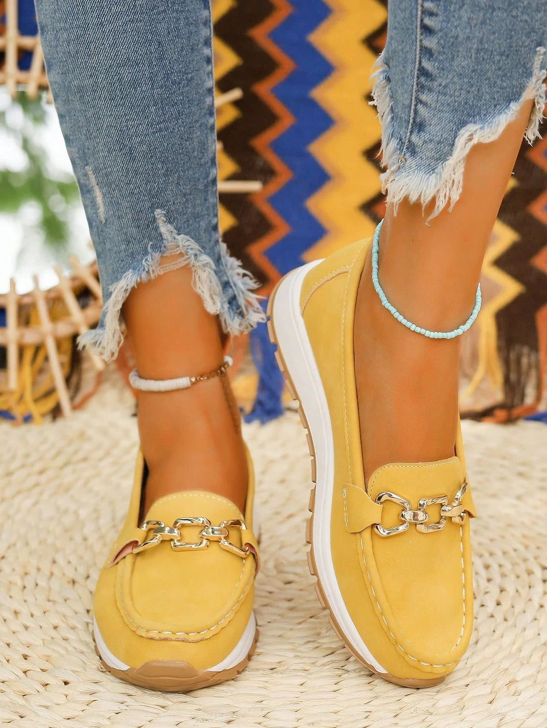 Women's slip-on loafers with gold buckle detail, flat wedge sole, polished everyday style