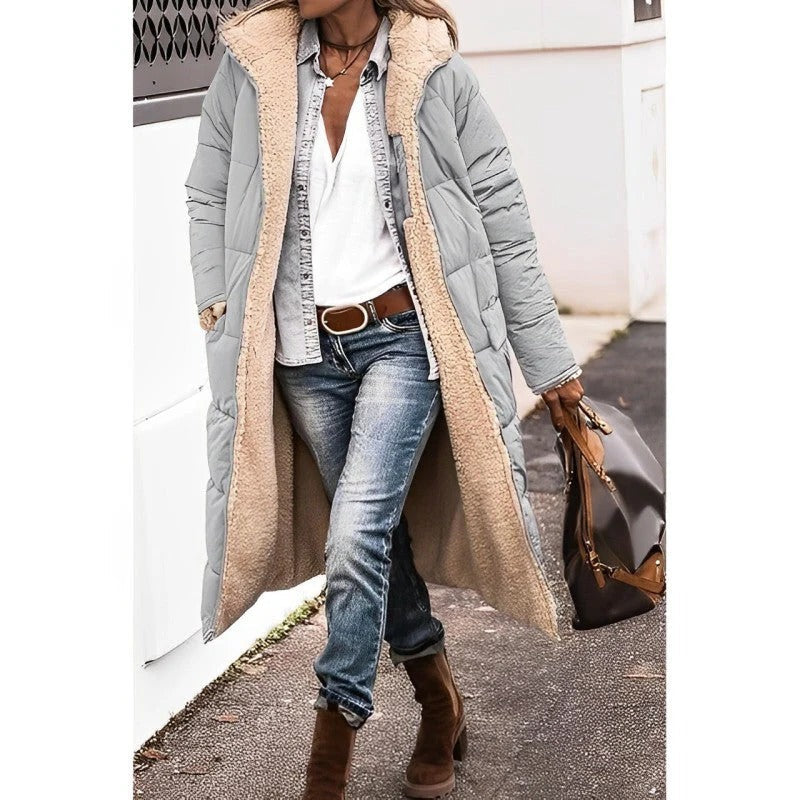 Women's longline quilted padded coat with hood, streamlined silhouette for cold-weather everyday outerwear